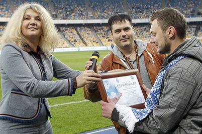PILOT hands Dynamo season ticket owner trip voucher to Austria!